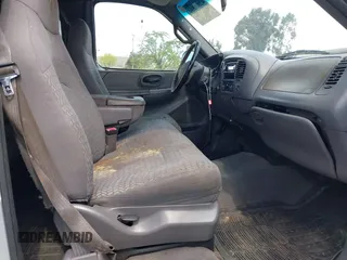 2001 Ford F-150 XL with VIN 1FTRX18L91KF29881, listed as a IAAI auction lot 42021554 with 199,041 mi miles. Bid and sale history available at carsss.com. Image 5.