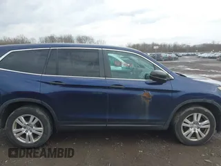 2016 Honda Pilot LX with VIN 5FNYF6H13GB061503, listed as a IAAI auction lot 42096651 with 226,785 mi miles. Bid and sale history available at carsss.com. Image 13.
