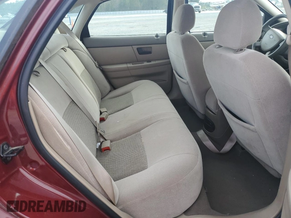 2005 Ford Taurus SE with VIN 1FAFP53205A282454, listed as a Copart auction lot 51052425 with 116,706 mi miles and Salvage Title. Bid and sale history available at carsss.com. Image 10.