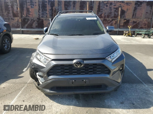 2021 Toyota RAV4 XLE Premium with VIN 2T3C1RFV3MC136191, listed as a Copart auction lot 61188995 with 53,524 mi miles and Salvage title. Bid and sale history available at DreamBid. Image 5.