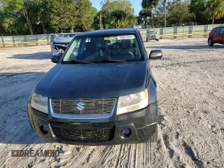 2007 Suzuki Grand Vitara z VIN JS3TE941674200553, wystawiony jako Copart lot #75667344 z przebiegiem 177 312 mil mil oraz Szkoda całkowita • Salvage title. Historia ofert i sprzedaży dostępna na DreamBid. Obrazek 12.