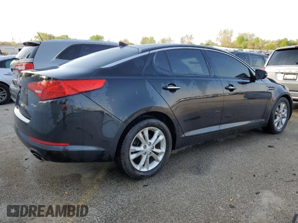 2012 Kia Optima EX with VIN 5XXGN4A74CG009290, listed as a Copart auction lot 50967574 with 217,906 mi miles and Salvage Title. Bid and sale history available at carsss.com. Image 3.