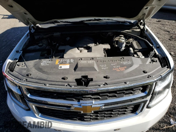 2020 Chevrolet Suburban Commercial with VIN 1GNSKKEC4LR213767, listed as a Copart auction lot 76527014 with 142,132 mi miles and Clean Title. Bid and sale history available at carsss.com. Image 12.