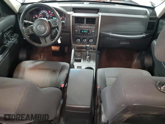 2012 Jeep Liberty Sport with VIN 1C4PJMAK1CW171926, listed as a Copart auction lot 83310004 with 180,085 mi miles and Salvage Title. Bid and sale history available at carsss.com. Image 8.