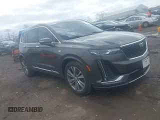 2020 Cadillac XT6 FWD Premium Luxury z VIN 1GYKPCRS0LZ136228, wystawiony jako IAAI lot #41912953 z przebiegiem Nie podano mil oraz . Historia ofert i sprzedaży dostępna na DreamBid. Obrazek 1.