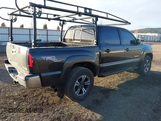 2006 Toyota Tacoma z VIN 5TELU42N26Z271569, wystawiony jako IAAI lot #41760118 z przebiegiem 123 299 mil mil oraz . Historia ofert i sprzedaży dostępna na DreamBid. Obrazek 4.