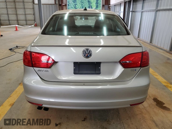 2014 Volkswagen Jetta TDI w/Premium with VIN 3VWLL7AJ9EM261908, listed as a Copart auction lot 60703205 with 128,892 mi miles and Salvage title. Bid and sale history available at DreamBid. Image 6.