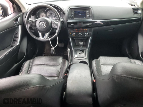 2014 Mazda CX-5 Grand Touring with VIN JM3KE4DY5E0392571, listed as a Copart auction lot 51044335 with 141,334 mi miles and Clean Title. Bid and sale history available at carsss.com. Image 8.