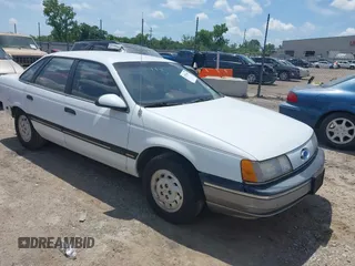 1990 Ford Taurus with VIN 1FACP52U9LG262588, listed as a IAAI auction lot 42555461 with 519,209 mi miles and . Bid and sale history available at DreamBid. Image 1.