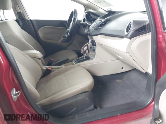 2017 Ford Fiesta SE z VIN 3FADP4BJ9HM159284, wystawiony jako IAAI lot #41291003 z przebiegiem 79 668 mil mil oraz . Historia ofert i sprzedaży dostępna na DreamBid. Obrazek 5.