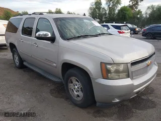 2007 Chevrolet Suburban LT with VIN 1GNFC16007R231427, listed as a IAAI auction lot 40995668 with 168,691 mi miles. Bid and sale history available at carsss.com. Image 1.