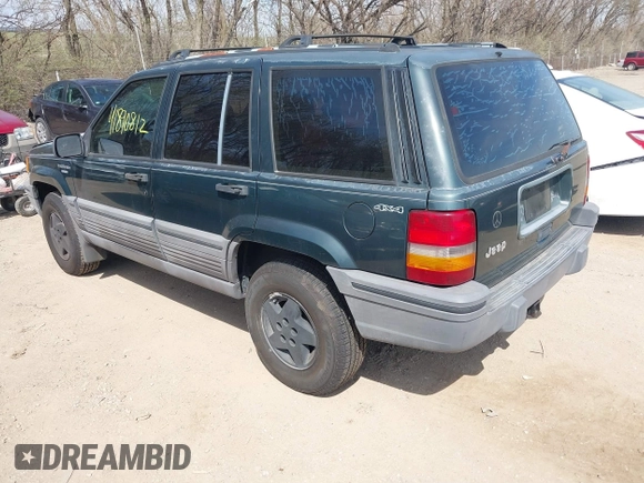 1994 Jeep Grand Cherokee Laredo with VIN 1J4GZ58S0RC266616, listed as a IAAI auction lot 41890812 with 190,000 mi miles. Bid and sale history available at carsss.com. Image 3.