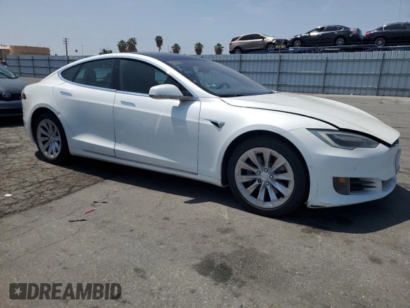 2017 Tesla Model S 60 with VIN 5YJSA1E16HF198903, listed as a Copart auction lot 60601565 with Not provided miles and Clean title. Bid and sale history available at DreamBid. Image 4.