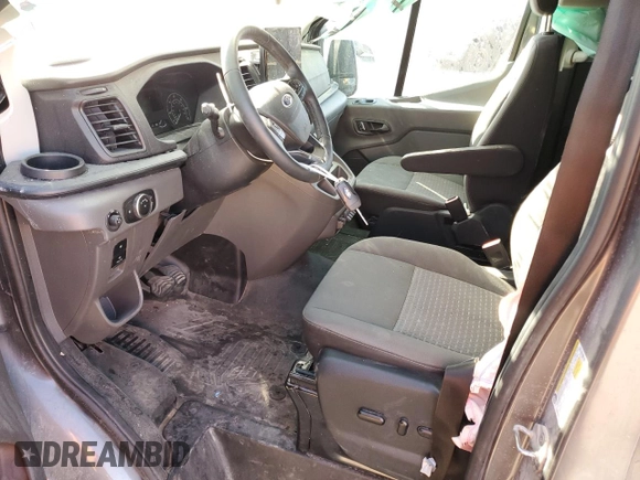 2023 Ford Transit Passenger XL with VIN 1FBAX9YG7PKA99683, listed as a Copart auction lot 72123694 with 21,370 mi miles and Salvage Title. Bid and sale history available at DreamBid. Image 7.