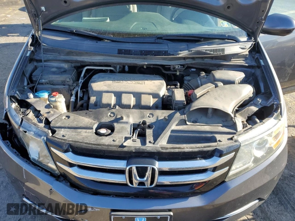 2017 Honda Odyssey SE with VIN 5FNRL5H37HB018616, listed as a Copart auction lot 87174674 with 124,367 mi miles and Salvage Title. Bid and sale history available at carsss.com. Image 12.