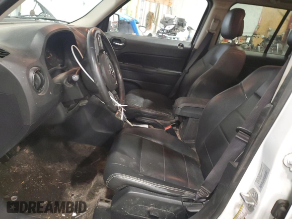 2015 Jeep Patriot High Altitude with VIN 1C4NJRFB5FD427093, listed as a Copart auction lot 88139895 with 67,182 mi miles and Salvage title. Bid and sale history available at DreamBid. Image 7.