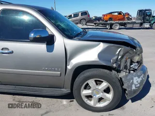 2007 Chevrolet Tahoe LTZ with VIN 1GNFC13J97R155705, listed as a IAAI auction lot 40914171 with 165,727 mi miles and . Bid and sale history available at DreamBid. Image 12.