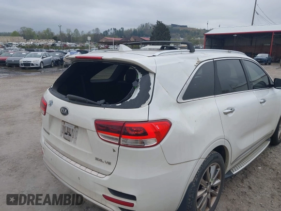 2016 Kia Sorento SX z VIN 5XYPKDA59GG113511, wystawiony jako IAAI lot #41997346 z przebiegiem 140 017 mil mil oraz . Historia ofert i sprzedaży dostępna na DreamBid. Obrazek 18.