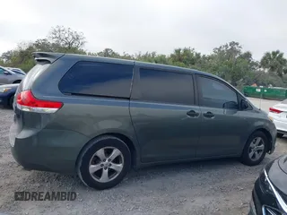 2014 Toyota Sienna L with VIN 5TDZK3DC6ES421278, listed as a IAAI auction lot 41178679 with 202,823 mi miles. Bid and sale history available at carsss.com. Image 13.