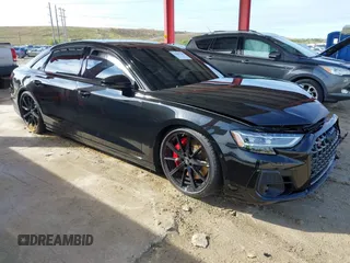 2024 Audi S8 with VIN WAULSAF86RN013889, listed as a IAAI auction lot 41401769 with 2,074 mi miles and . Bid and sale history available at DreamBid. Image 1.