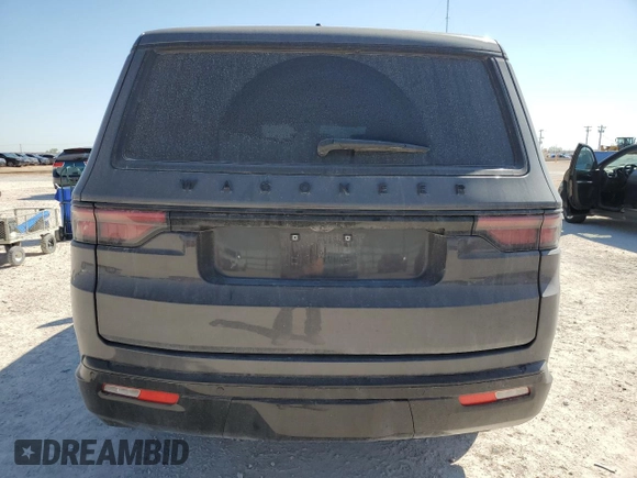 2024 Jeep Wagoneer Series II Carbide with VIN 1C4SJVBP4RS107924, listed as a Copart auction lot 71017184 with 15,695 mi miles and Salvage Title. Bid and sale history available at DreamBid. Image 6.