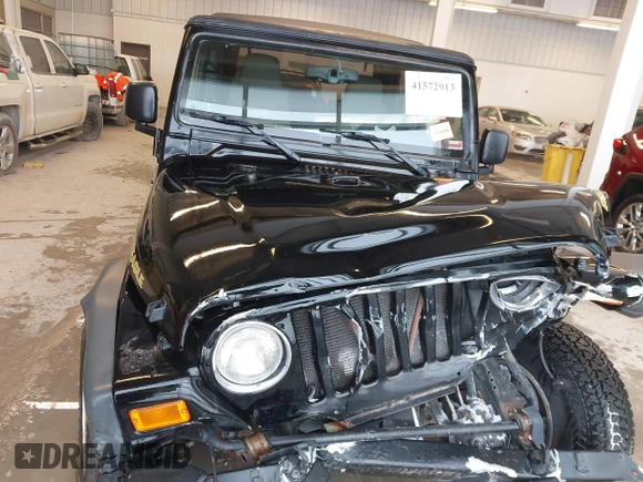 2006 Jeep Wrangler Sport with VIN 1J4FA49S96P733712, listed as a IAAI auction lot 41572913 with 93,511 mi miles. Bid and sale history available at carsss.com. Image 12.