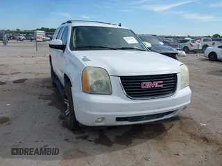 2007 GMC Yukon SLT z VIN 1GKFK13087J109563, wystawiony jako IAAI lot #42324518 z przebiegiem 241 485 mil mil oraz . Historia ofert i sprzedaży dostępna na DreamBid. Obrazek 1.