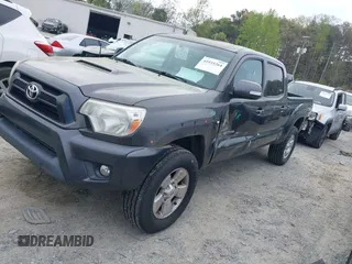 2015 Toyota Tacoma with VIN 3TMMU4FNXFM073978, listed as a IAAI auction lot 41935264 with 132,806 mi miles and . Bid and sale history available at DreamBid. Image 17.