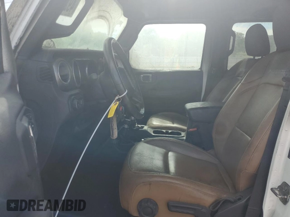 2020 Jeep Wrangler Unlimited Rubicon z VIN 1C4HJXFG6LW306683, wystawiony jako Copart lot #49234675 z przebiegiem Nie podano mil oraz Szkoda całkowita • Salvage title. Historia ofert i sprzedaży dostępna na DreamBid. Obrazek 7.