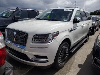 2020 Lincoln Navigator Black Label z VIN 5LMJJ3TT4LEL21595, wystawiony jako Copart lot #73951494 z przebiegiem Nie podano mil oraz Szkody całkowita. Historia ofert i sprzedaży dostępna na DreamBid. Obrazek 1.