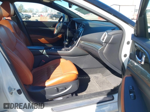 2020 Nissan Maxima Platinum with VIN 1N4AA6FV6LC374693, listed as a IAAI auction lot 41253104 with 123,231 mi miles and . Bid and sale history available at DreamBid. Image 5.