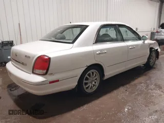 2002 Hyundai XG L z VIN KMHFU45EX2A180204, wystawiony jako IAAI lot #41472564 z przebiegiem 148 333 mil mil oraz . Historia ofert i sprzedaży dostępna na DreamBid. Obrazek 4.