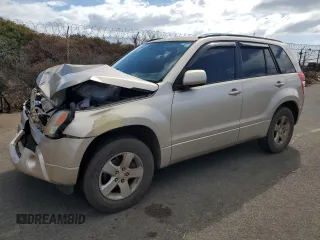 2010 Suzuki Grand Vitara z VIN JS3TD0D43A4100295, wystawiony jako Copart lot #79756474 z przebiegiem 89 492 mil mil oraz Szkoda całkowita • Salvage title. Historia ofert i sprzedaży dostępna na DreamBid. Obrazek 1.