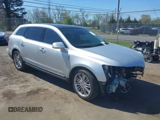 2015 Lincoln MKT EcoBoost with VIN 2LMHJ5AT4FBL00959, listed as a IAAI auction lot 41991763 with 159,687 mi miles and . Bid and sale history available at DreamBid. Image 1.