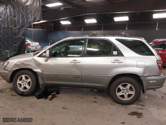 1999 Lexus RX 300 Luxury SUV with VIN JT6HF10U8X0065898, listed as a IAAI auction lot 38515585 with NaN miles. Bid and sale history available at carsss.com. Image 14.