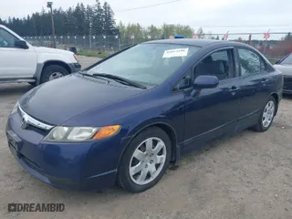 2008 Honda Civic Sdn LX with VIN 1HGFA16528L116411, listed as a IAAI auction lot 42017196 with 124,124 mi miles. Bid and sale history available at carsss.com. Image 2.