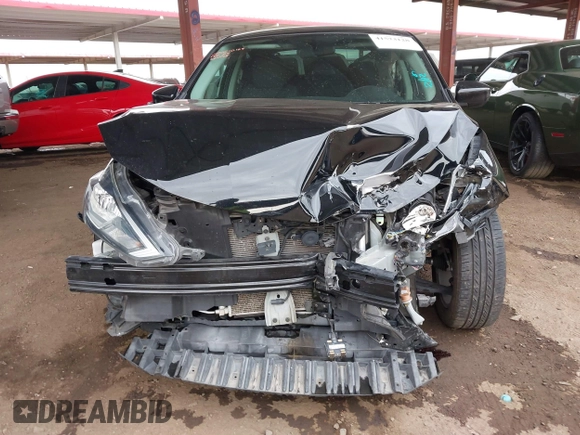 2019 Nissan Sentra S with VIN 3N1AB7AP9KY387730, listed as a IAAI auction lot 41573128 with 59,630 mi miles and . Bid and sale history available at DreamBid. Image 12.