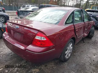 2005 Ford Five Hundred Limited with VIN 1FAFP25155G129701, listed as a IAAI auction lot 41402097 with 86,264 mi miles. Bid and sale history available at carsss.com. Image 4.