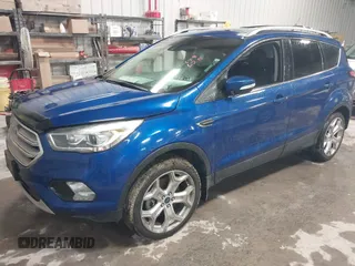 2018 Ford Escape Titanium with VIN 1FMCU9J99JUB94925, listed as a IAAI auction lot 42412800 with 95,880 mi miles and . Bid and sale history available at DreamBid. Image 18.