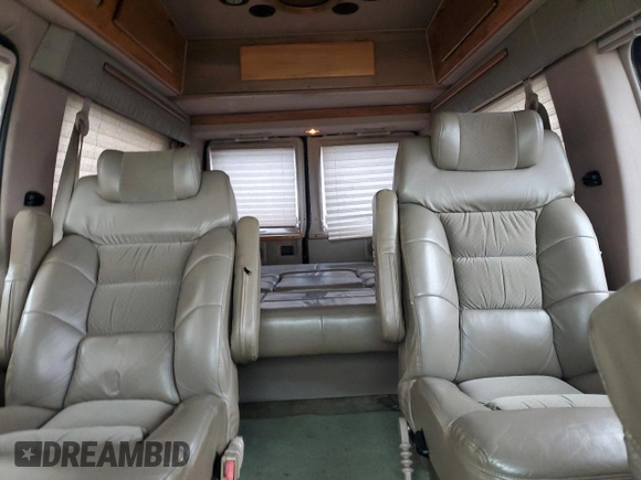 2001 Ford Econoline Cargo Recreational with VIN 1FDPE24L51HB59174, listed as a Copart auction lot 84857404 with 129,690 mi miles and Salvage Title. Bid and sale history available at DreamBid. Image 10.