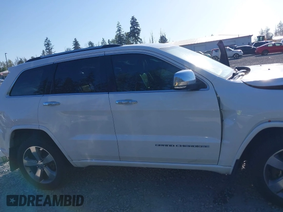 2015 Jeep Grand Cherokee Overland with VIN 1C4RJFCT6FC653386, listed as a IAAI auction lot 42084723 with 101,993 mi miles. Bid and sale history available at carsss.com. Image 13.