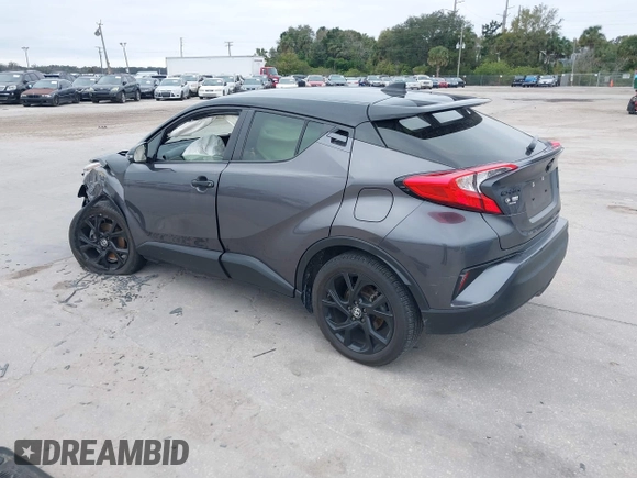 2021 Toyota C-HR LE with VIN JTNKHMBX3M1120177, listed as a IAAI auction lot 41257866 with 43,964 mi miles. Bid and sale history available at carsss.com. Image 3.