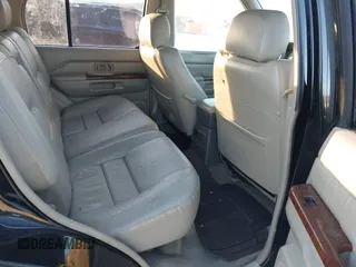 1998 Infiniti QX4 with VIN JNRAR05Y2WW028333, listed as a IAAI auction lot 41759775 with 216,473 mi miles and . Bid and sale history available at DreamBid. Image 8.