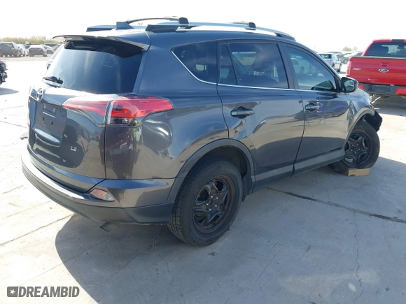 2018 Toyota RAV4 LE with VIN 2T3ZFREV4JW412661, listed as a IAAI auction lot 41781229 with 140,131 mi miles. Bid and sale history available at carsss.com. Image 4.