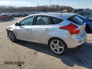 2014 Ford Focus Titanium z VIN 1FADP3N2XEL263357, wystawiony jako Copart lot #84610634 z przebiegiem 142 023 mil mil oraz Nie do naprawy • Non repairable. Historia ofert i sprzedaży dostępna na DreamBid. Obrazek 2.