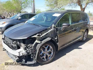 2017 Chrysler Pacifica Touring L with VIN 2C4RC1BG0HR826881, listed as a IAAI auction lot 42171240 with 214,188 mi miles and . Bid and sale history available at DreamBid. Image 17.