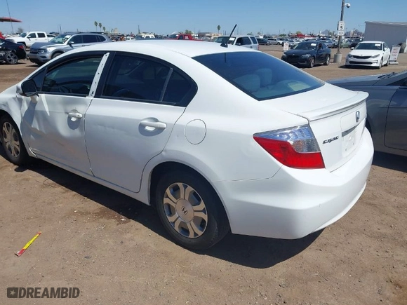 2012 Honda Civic Hybrid with VIN JHMFB4F24CS005990, listed as a IAAI auction lot 41978020 with 164,915 mi miles. Bid and sale history available at carsss.com. Image 3.