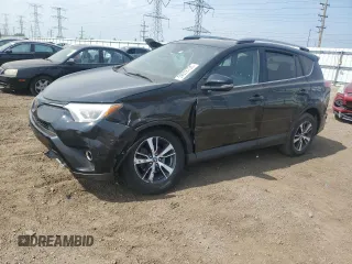 2018 Toyota RAV4 XLE with VIN 2T3RFREV1JW765276, listed as a Copart auction lot 59978755 with 115,352 mi miles and Salvage title. Bid and sale history available at DreamBid. Image 1.