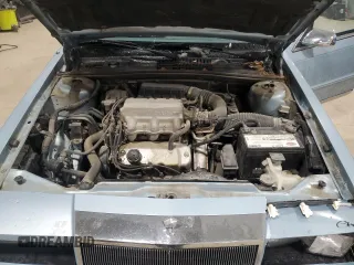 1989 Chrysler New Yorker z VIN 1C3BC663XKD578434, wystawiony jako Copart lot #84945044 z przebiegiem 51 067 mil mil oraz Szkody całkowita. Historia ofert i sprzedaży dostępna na DreamBid. Obrazek 11.