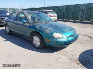 1997 Ford Taurus GL with VIN 1FALP52UXVA147715, listed as a IAAI auction lot 41738247 with 146,950 mi miles. Bid and sale history available at carsss.com. Image 1.